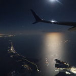 Saliendo de Houston, sobrevolando el golfo de México con luna llena